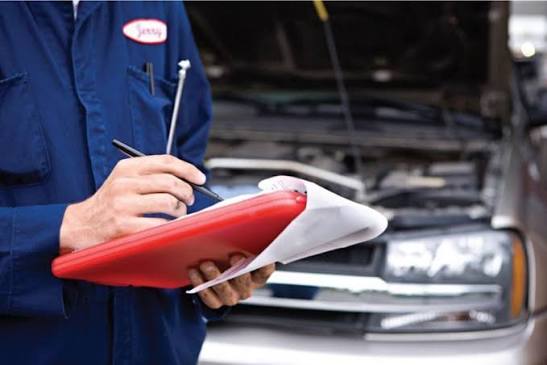 Technician talking to customer